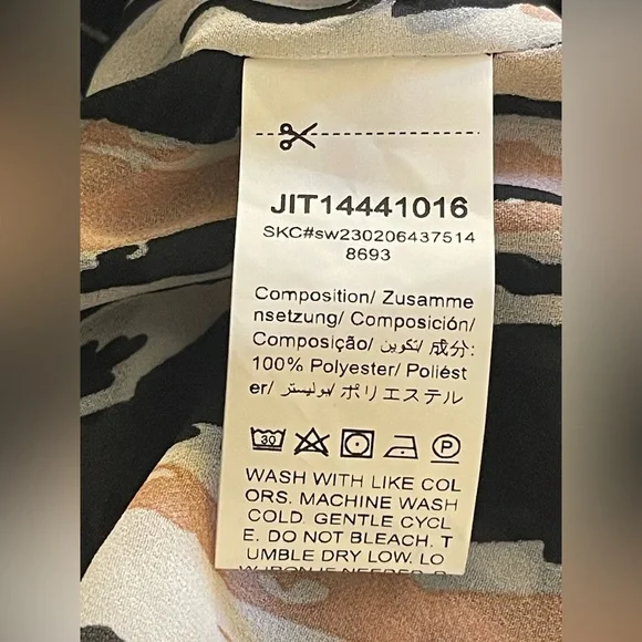 Black and White and beige Ruffled Short Sleeve Blouse - Picture 6 of 7